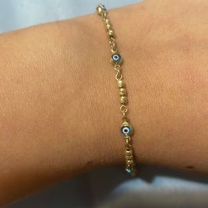14kt solid gold evil eye bracelet